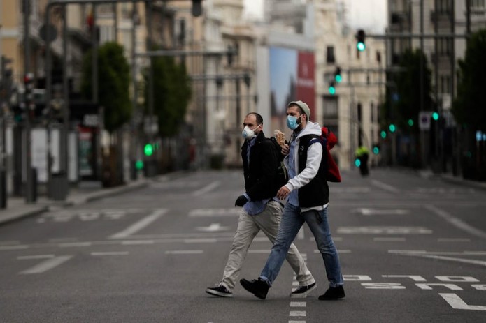 Spain sees coronavirus torment easing, seeks new economic 'pact'