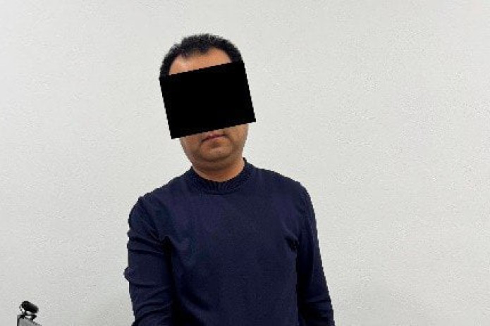 Oliy taʼlim vazirligi xodimi 100 ming dollar olgan vaqtida ushlandi