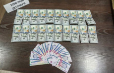 “Biznesni rivojlantirish banki” xodimi 2,1 ming dollar bilan qo'lga tushdi